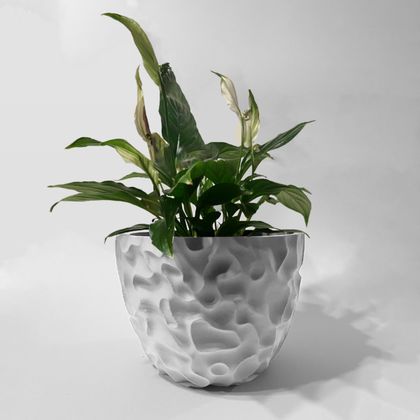 White 3D-printed sculptural planter with texture surface