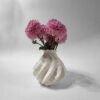 Astraeus white vase showing curved vertical geometry and minimalist silhouette