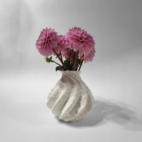 Astraeus white vase showing curved vertical geometry and minimalist silhouette