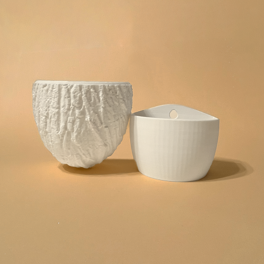 3D printed white wall planters in soft peachy background – sustainable sculptural home accent