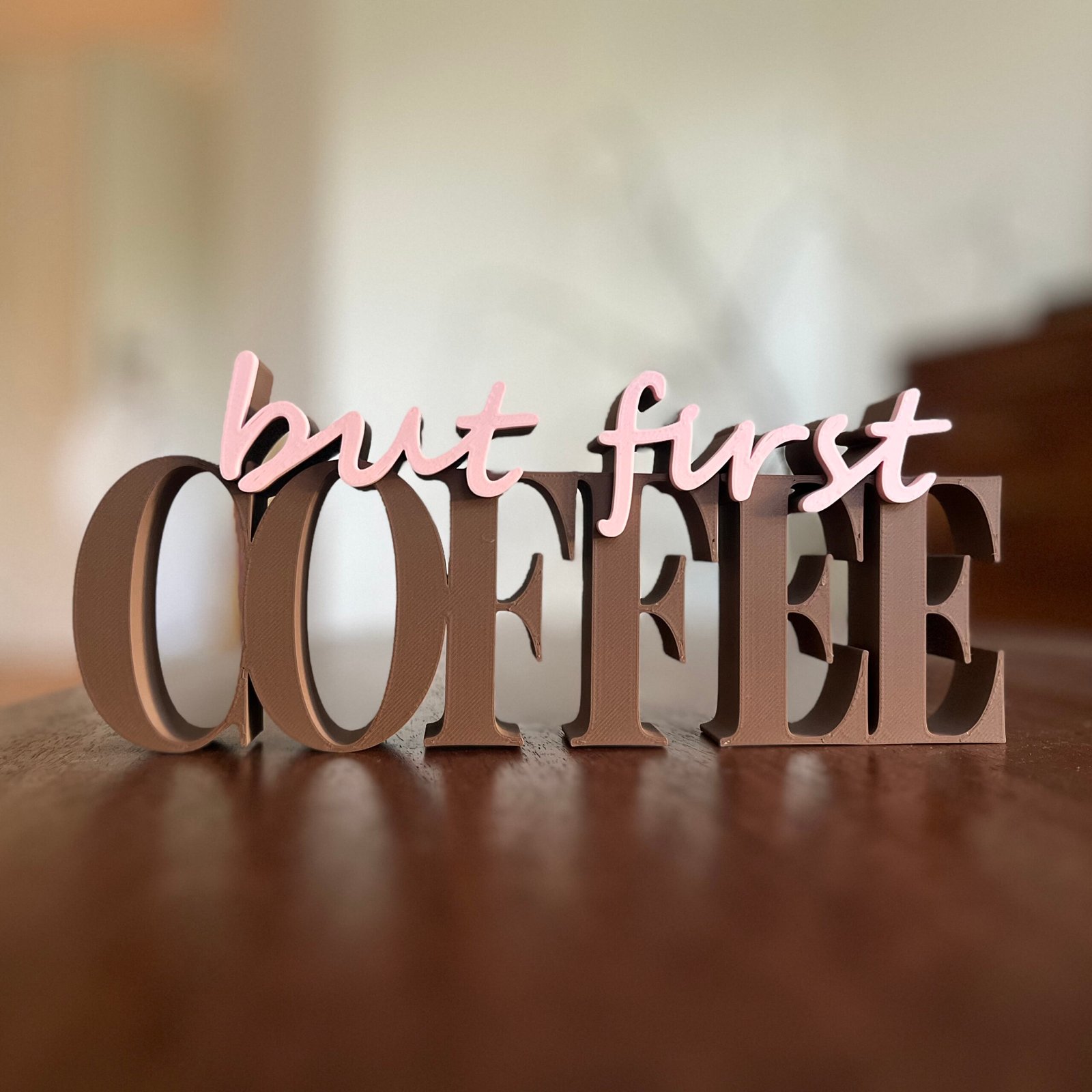But First Coffee sign on the table