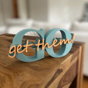 Go Get Them Sign product on the table